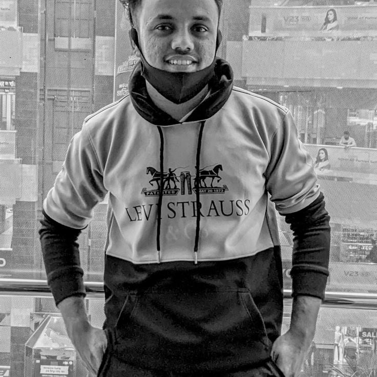 Jordan Lee, Client Relations Director, discussing corporate gifting strategy with business clients